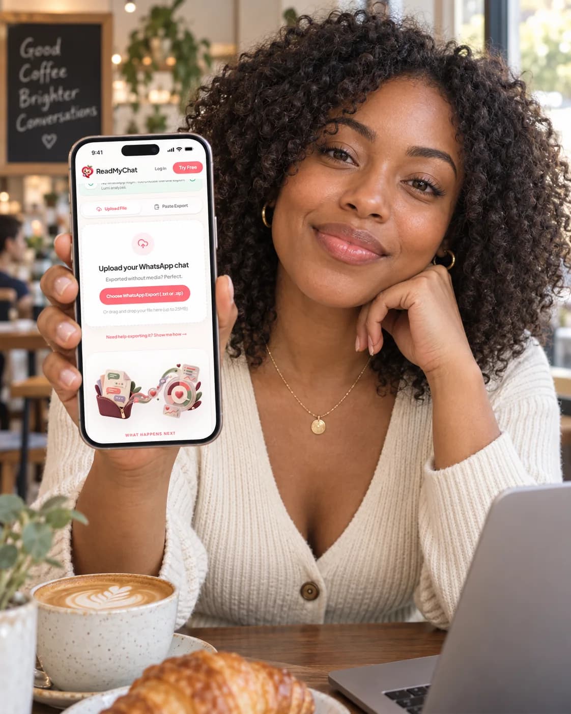 Woman in a cafe holding a phone with the ReadMyChat upload screen